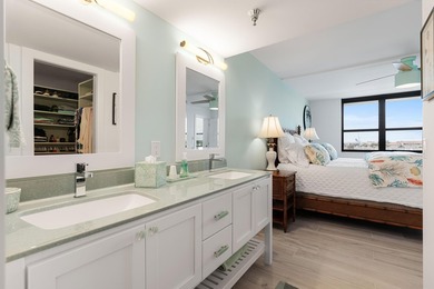 Experience elevated coastal living in this immaculate, fully - photo 28