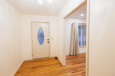 This classic ranch-style home sits gracefully on 62 sprawling - photo 4