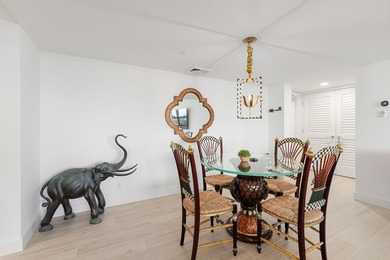 Experience elevated coastal living in this immaculate, fully - photo 35