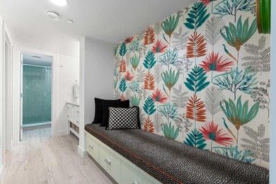 Experience elevated coastal living in this immaculate, fully - photo 38