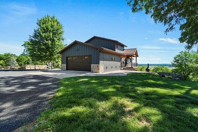 Perched high atop a ridge with breathtaking views that stretch - photo 1