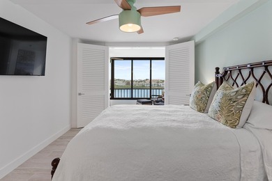 Experience elevated coastal living in this immaculate, fully - photo 42
