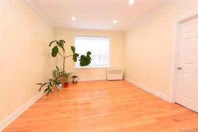 Welcome to this beautifully maintained brick two-family home in - photo 14