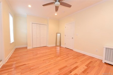 Welcome to this beautifully maintained brick two-family home in - photo 15