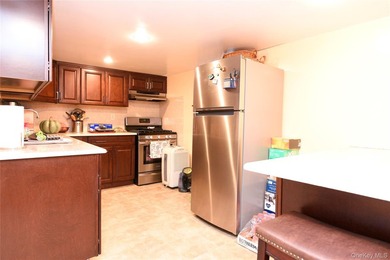 Welcome to this beautifully maintained brick two-family home in - photo 19