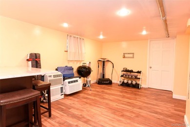 Welcome to this beautifully maintained brick two-family home in - photo 21