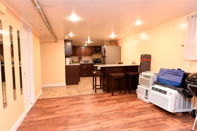 Welcome to this beautifully maintained brick two-family home in - photo 22