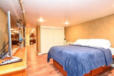 Welcome to this beautifully maintained brick two-family home in - photo 23