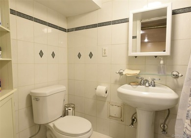 Welcome to this beautifully maintained brick two-family home in - photo 25