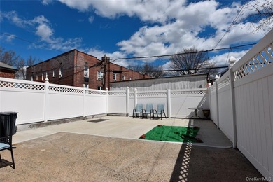 Welcome to this beautifully maintained brick two-family home in - photo 26