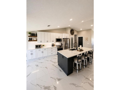 Welcome to this beautifully renovated 3-bedroom, 2-bath home - photo 4