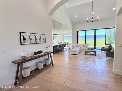 This home perfectly blends luxury with practicality. It offers a - photo 5