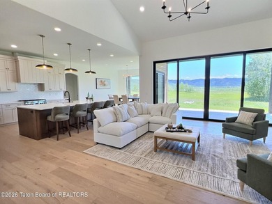 This home perfectly blends luxury with practicality. It offers a - photo 6