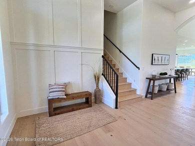 This home perfectly blends luxury with practicality. It offers a - photo 7