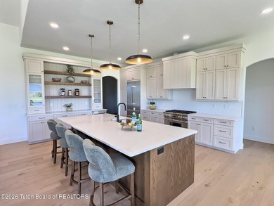 This home perfectly blends luxury with practicality. It offers a - photo 9