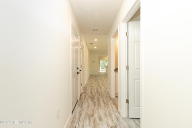 Welcome to this beautifully designed 3-bedroom, 2-bath home - photo 3