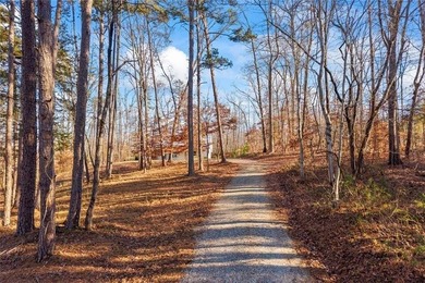 Nestled in a peaceful setting on 6.5 acres, this inviting home - photo 4