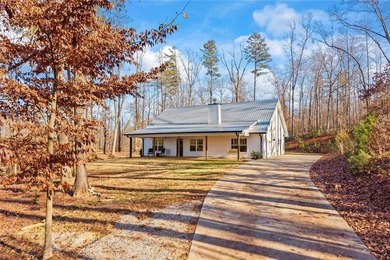 Nestled in a peaceful setting on 6.5 acres, this inviting home - photo 5