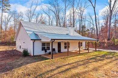 Nestled in a peaceful setting on 6.5 acres, this inviting home - photo 6