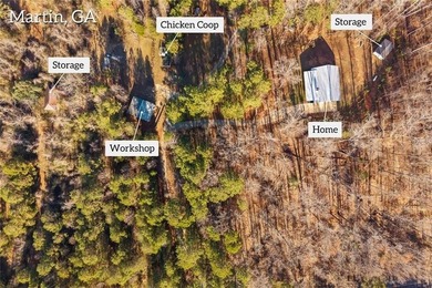 Nestled in a peaceful setting on 6.5 acres, this inviting home - photo 8
