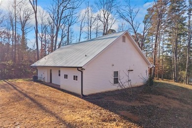 Nestled in a peaceful setting on 6.5 acres, this inviting home - photo 10