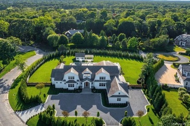Nestled in the picturesque community of Westhampton Beach, this - photo 1