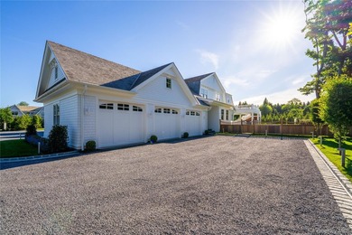 Nestled in the picturesque community of Westhampton Beach, this - photo 2
