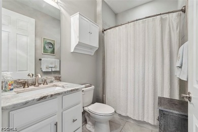 Welcome to this exceptional 4-bedroom, 2-bath pool home in the - photo 6