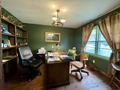 Lovely brick ranch-style home with just over 12 acres! Through - photo 7