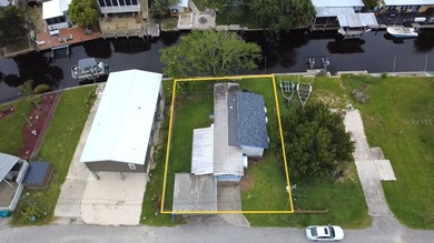 Turnkey waterfront property offering direct canal access to the - photo 1