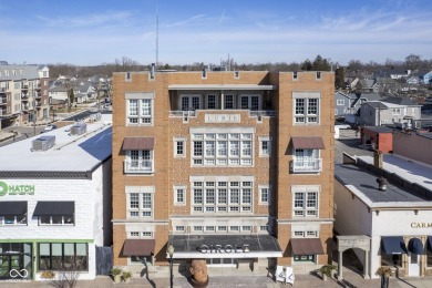 Welcome to luxury living in the heart of downtown Carmel! This