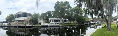 Turnkey waterfront property offering direct canal access to the - photo 8