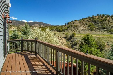 This inviting home features panoramic mountain views and a - photo 15