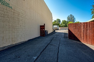 Lot is 30,928 sq ft with 3 buildings. The main building is a two - photo 2