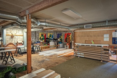 Lot is 30,928 sq ft with 3 buildings. The main building is a two - photo 8