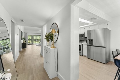Welcome to this beautifully remodeled second-floor condo in the - photo 4