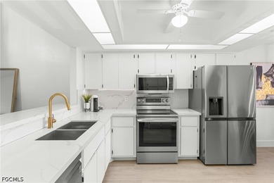 Welcome to this beautifully remodeled second-floor condo in the - photo 6