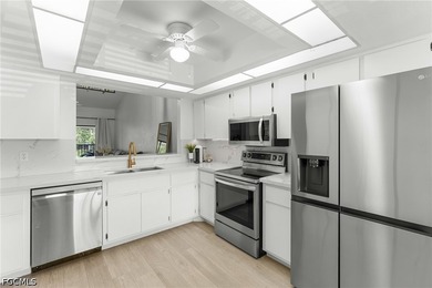 Welcome to this beautifully remodeled second-floor condo in the - photo 8