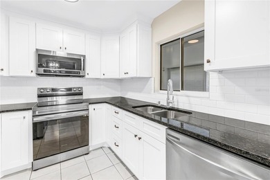 Welcome to Paradise says this charming ranch home in the Twin - photo 8