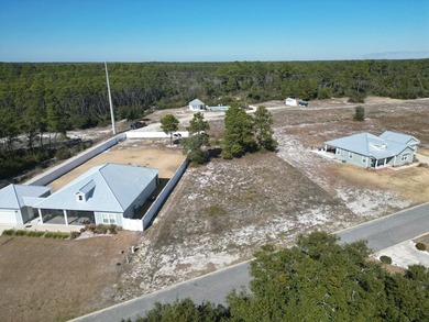 Build your coastal dream home on this 0.76-acre vacant lot in - photo 4