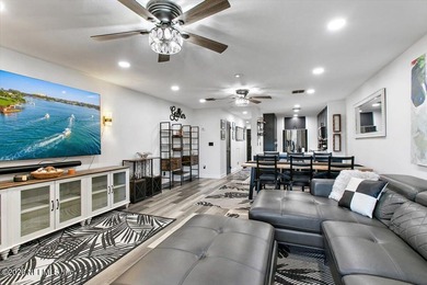 WHERE MODERN DESIGN MEETS WATERFRONT PERFECTION! Welcome to this