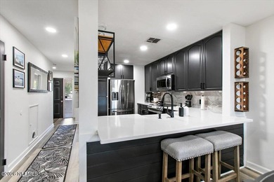 WHERE MODERN DESIGN MEETS WATERFRONT PERFECTION! Welcome to this