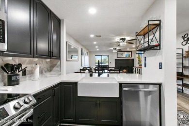 WHERE MODERN DESIGN MEETS WATERFRONT PERFECTION! Welcome to this