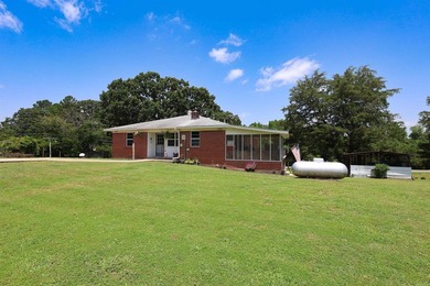 Classic brick home with room to spread out! Situated on - photo 3