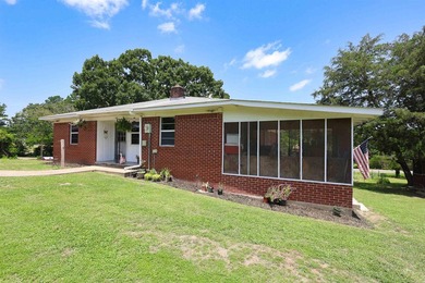 Classic brick home with room to spread out! Situated on - photo 4