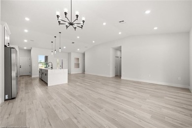 As you arrive, the clean architectural lines and spacious - photo 9