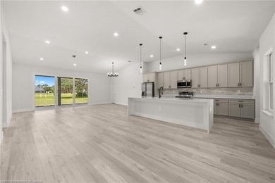 As you arrive, the clean architectural lines and spacious - photo 10