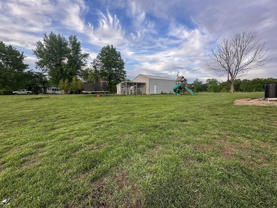 This well-maintained 3-bedroom, 3.5-bath ranch-style home offers - photo 9