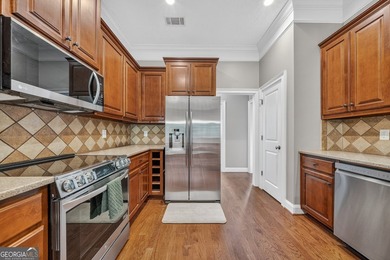 Welcome home to this beautifully maintained all-brick ranch - photo 15
