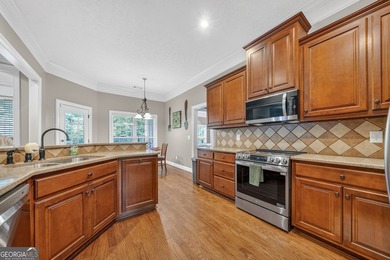 Welcome home to this beautifully maintained all-brick ranch - photo 16